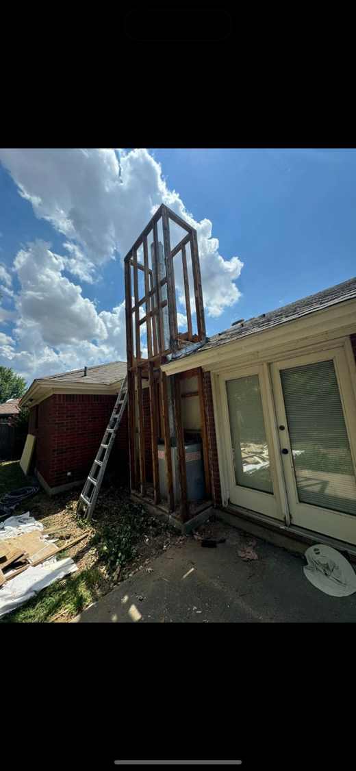 Before chimney chase rebuild after damaged siding removal